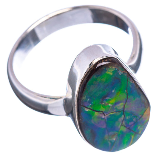 Sterling silver ring with oval ammolite stone showing blue-green iridescence
