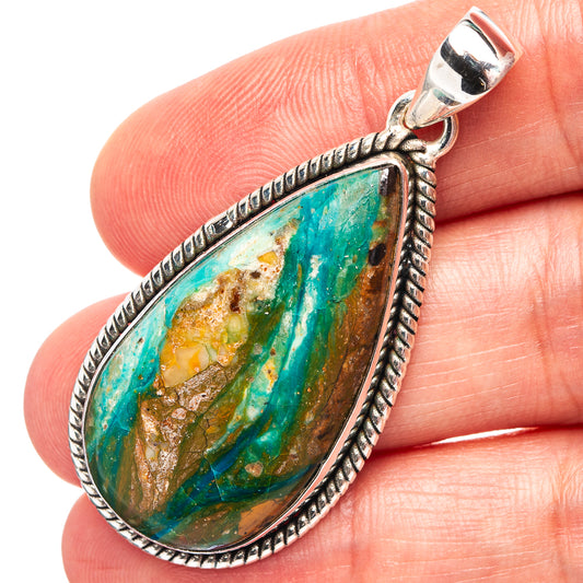 Sterling silver teardrop opal pendant with teal, green, and brown stone
