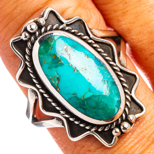 Turquoise oval cabochon sterling silver ring with ornate scalloped edge