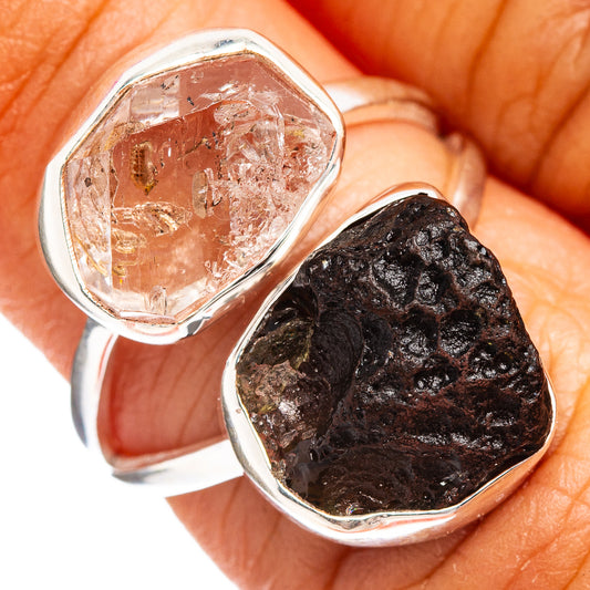 Sterling silver ring with clear faceted gemstone and dark brown rough stone