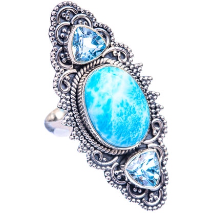 Sterling silver ring with large oval blue-green stone and two oval blue gemstone accents