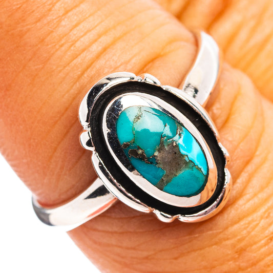 Turquoise oval stone sterling silver ring with double metal bezel, size 7.5