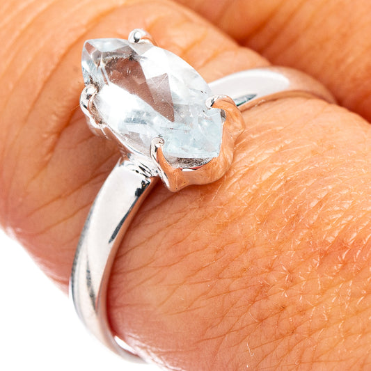 Aquamarine gemstone oval ring with .925 sterling silver band, prong-set setting