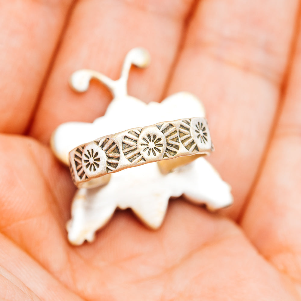 Southwestern sterling silver ring band with starburst engraving and openwork design