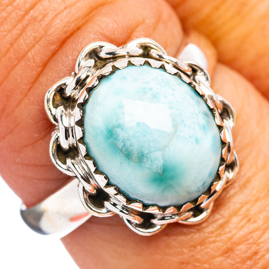 Sterling silver ring with round-oval blue-green larimar gemstone, ornate setting