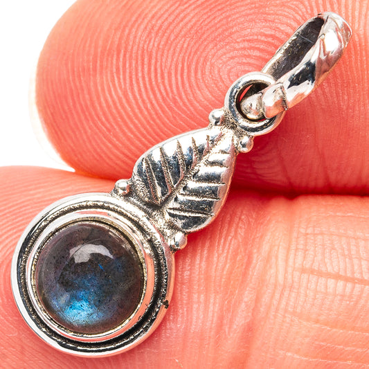 Dainty labradorite pendant in .925 sterling silver with round bezel and leaf bail