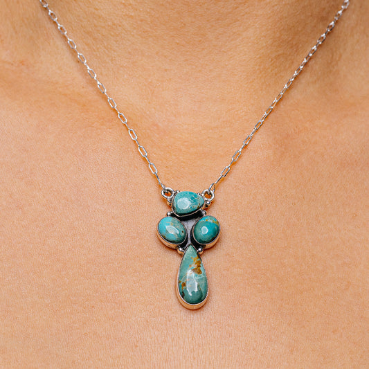 Turquoise teardrop pendant necklace with .925 sterling silver chain, 16–18 in