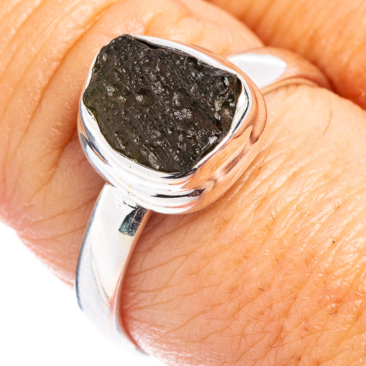 Sterling silver moldavite ring with dark green raw stone, size 8.75, close-up top
