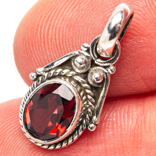 Dainty garnet gemstone pendant in .925 sterling silver, ornate halo setting.