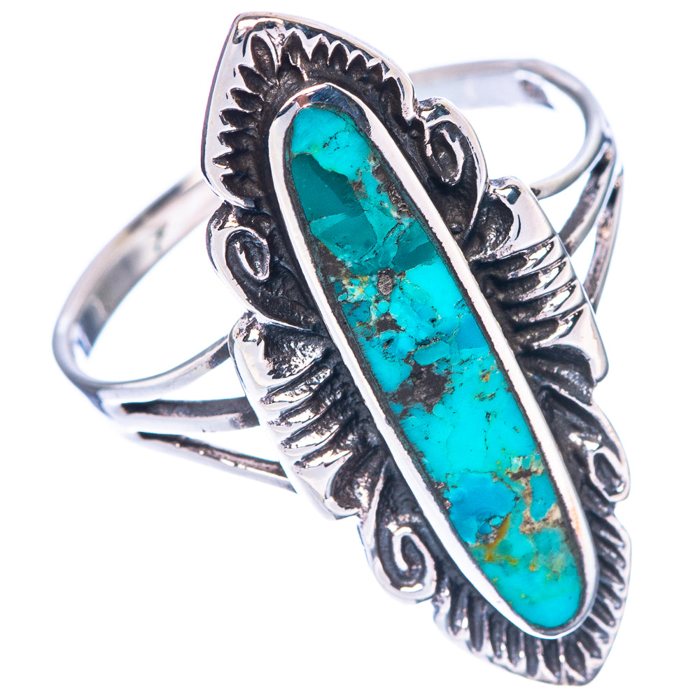 Turquoise oval cabochon ring, raised bezel with engraved floral-style edges