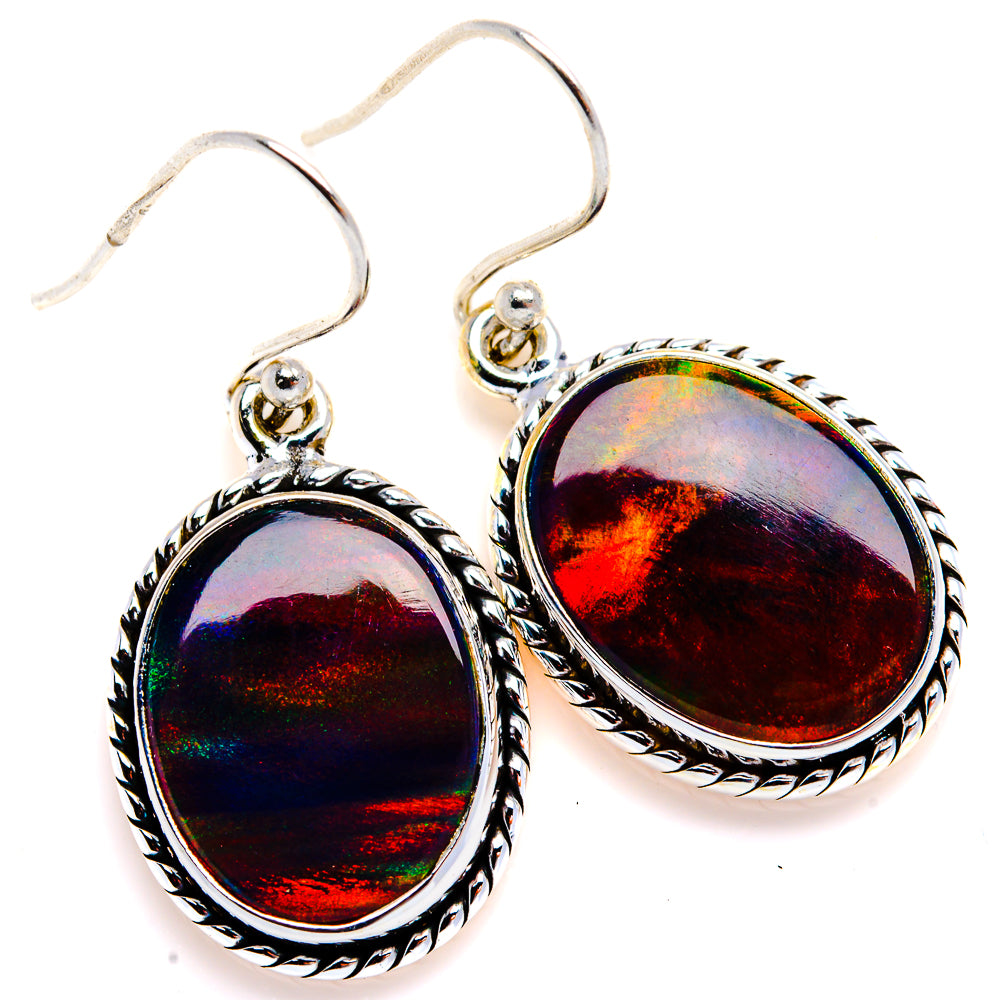 Sterling silver oval opal dangle earrings with colorful iridescent red-blue gemstone