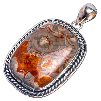 Sterling silver oval pendant with marbled rhyolite, scalloped rope-edge frame