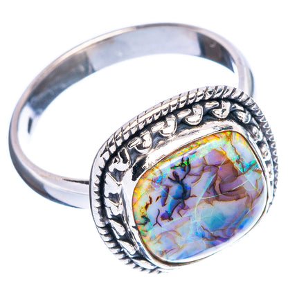 Sterling silver opal ring with oval bezel, multicolor iridescent stone and detailed band