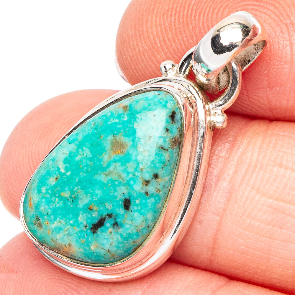 Sterling silver turquoise oval pendant with teardrop bezel and loop bail