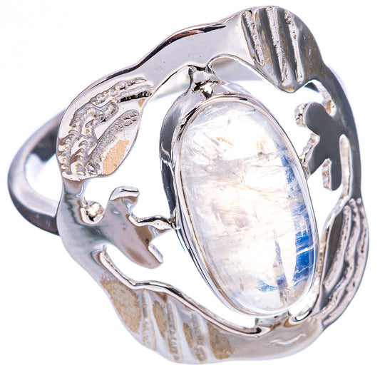 Sterling silver ring showing oval moonstone cabochon and detailed engraved side band