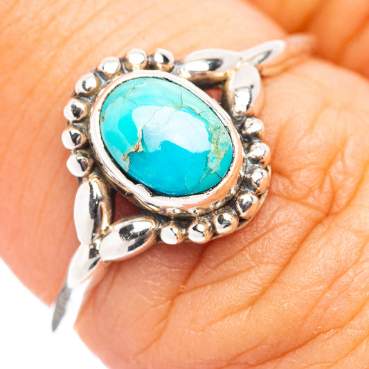 Sterling silver turquoise oval ring with scalloped bezel and detailed band