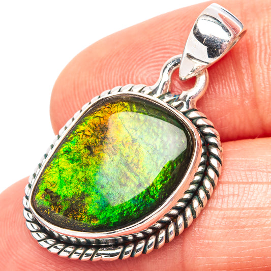Oval ammolite pendant in .925 sterling silver bezel, green iridescent stone detail