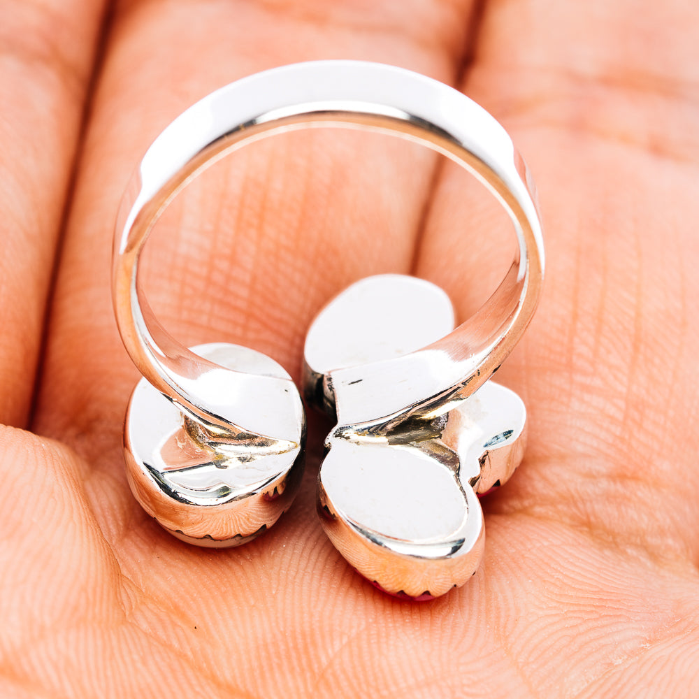 Sterling silver ring band with polished openwork design and decorative scalloped ends