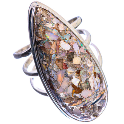 Oval sterling silver ring with Ethiopian opal mosaic inlay, dark bezel band