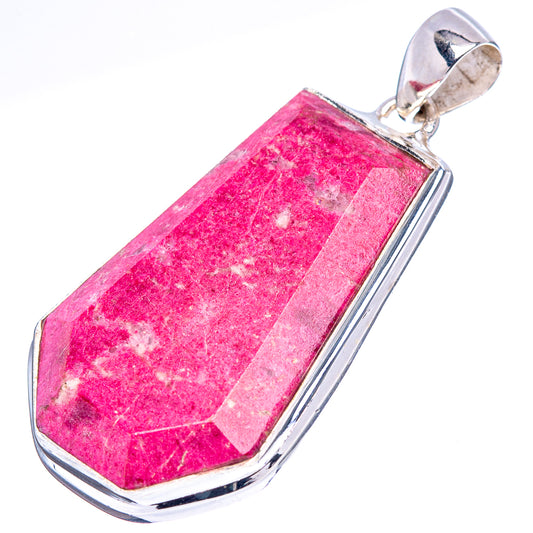 Pink thulite pendant with polished .925 sterling silver frame, teardrop facet view.
