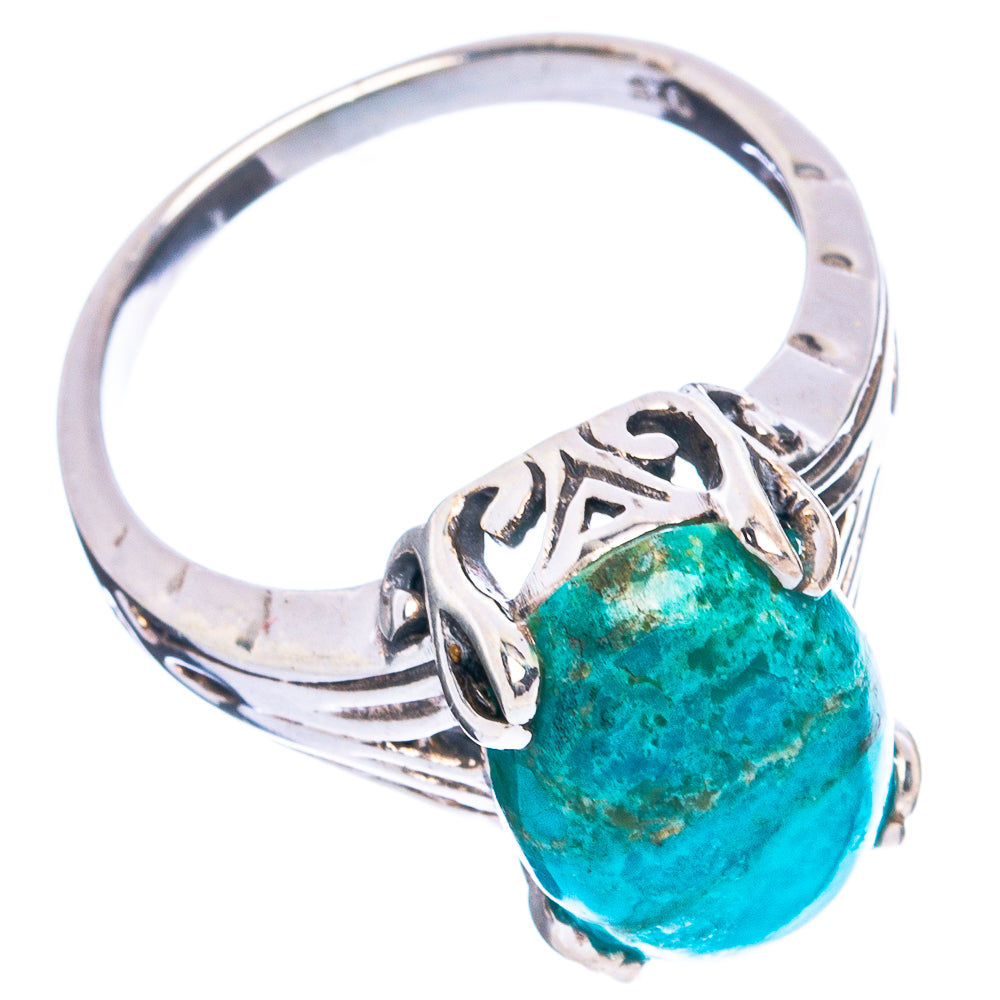 Sterling silver turquoise ring with oval cabochon and ornate cutout band
