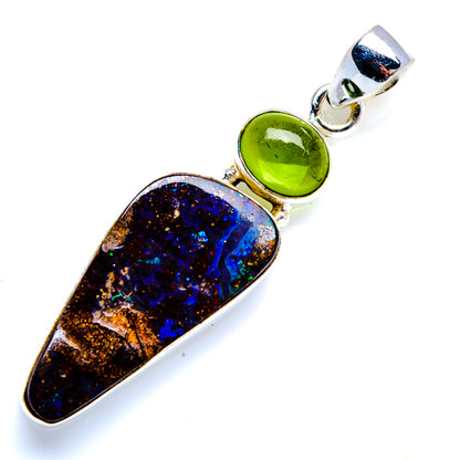 Sterling silver opal and peridot pendant with oval dark opal and round green center stone