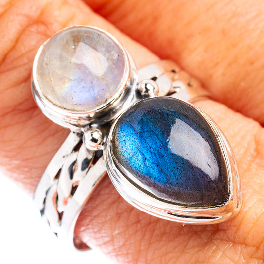Sterling silver double-stone ring with oval blue-gray gemstone and round moonstone