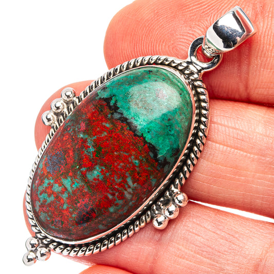 Oval .925 sterling silver pendant with Sonora sunrise stone in red and green, bail on top