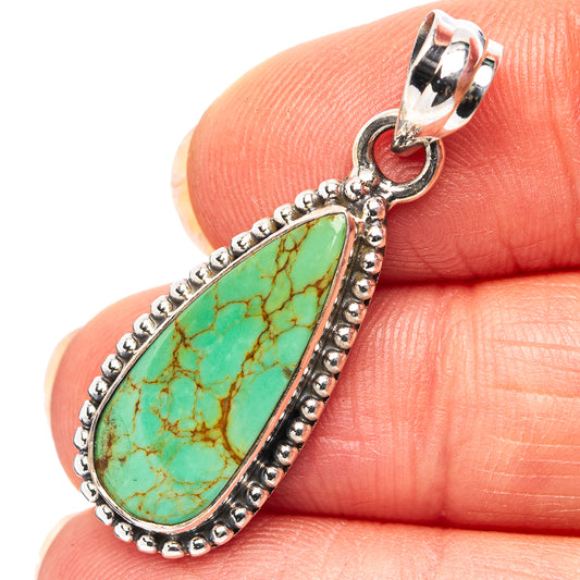 Turquoise teardrop pendant in .925 sterling silver with beaded bezel