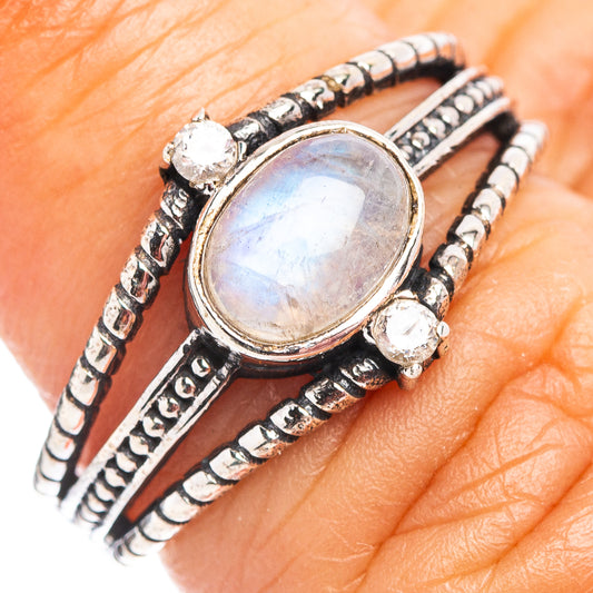 Sterling silver moonstone dainty ring with oval rainbow moonstone center and textured band