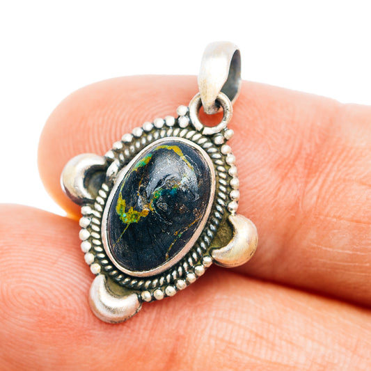 Southwestern silver jack pendant with oval bead border and dark blue turquoise stone
