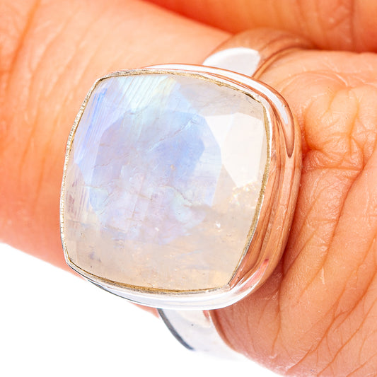 Faceted moonstone ring on finger, square cushion stone in silver setting