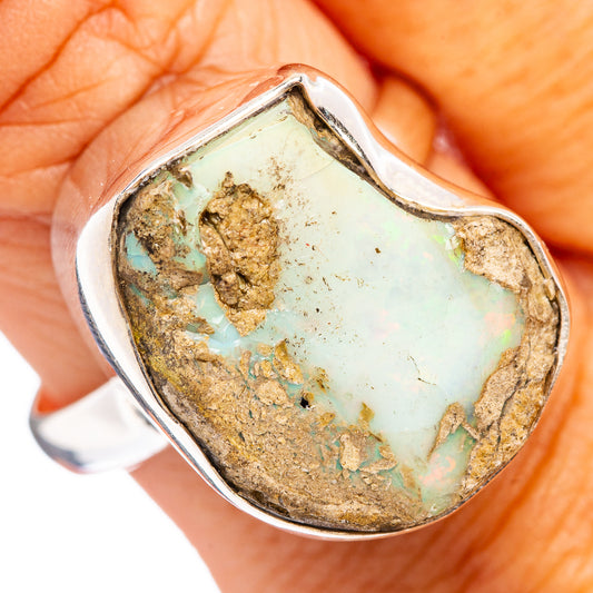 Sterling silver raw opal ring with turquoise heart-shaped stone and gold-brown matrix