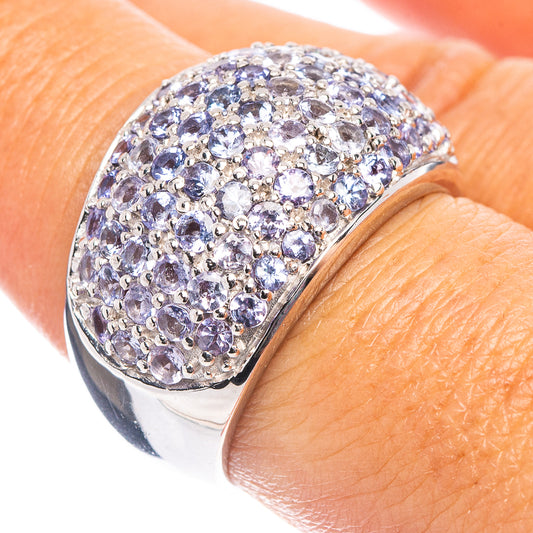Sterling silver ring with oval cluster of faceted blue-purple stones on top