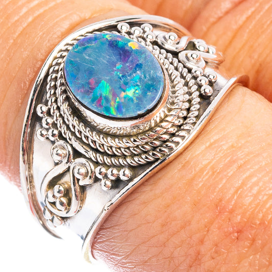 Sterling silver opal doublet ring, oval blue iridescent stone in ornate bezel