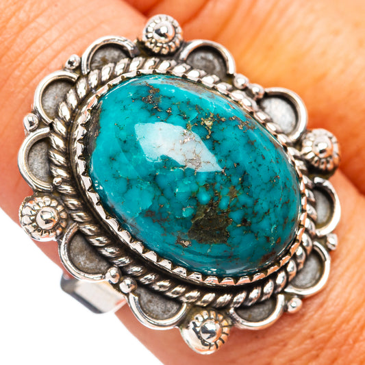 Oval turquoise cabochon sterling silver ring with ornate bezel, beaded border