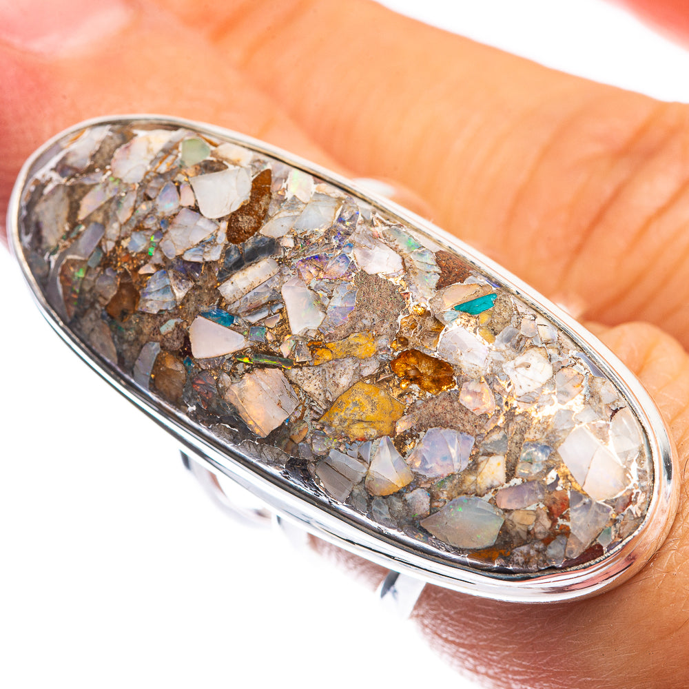 Sterling silver oval opal ring with colorful brecciated stone in a bezel setting