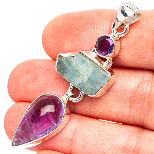 925 sterling silver pendant with aquamarine and amethyst cabochons, bail at top