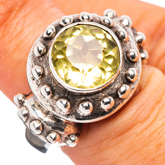Yellow lemon quartz ring in .925 sterling silver bezel with studded halo