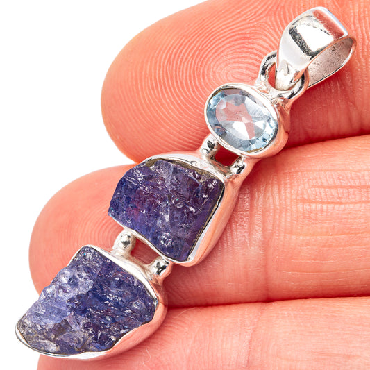 925 sterling silver pendant with oval blue topaz and rough purple tanzanite stones