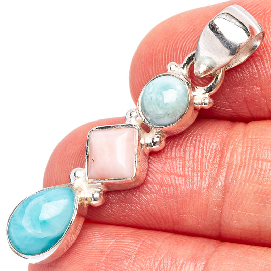 Sterling silver pendant with pink opal square and two oval blue stones