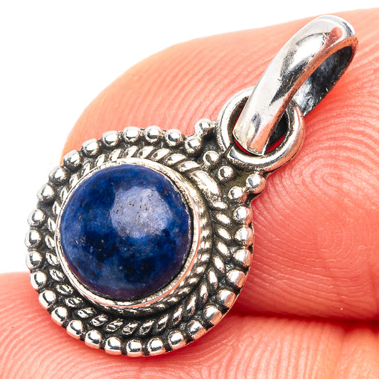 Sterling silver lapis lazuli pendant with round blue cabochon in ornate bezel