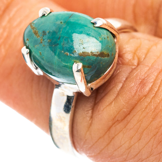 Sterling silver ring with turquoise oval cabochon and split prongs