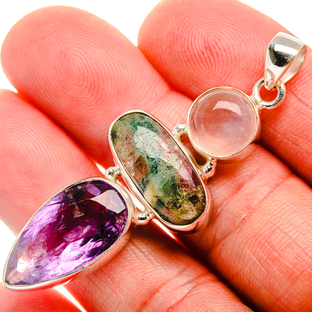 Silver pendant close-up with faceted amethyst, multicolor tourmaline, rose quartz cabochon