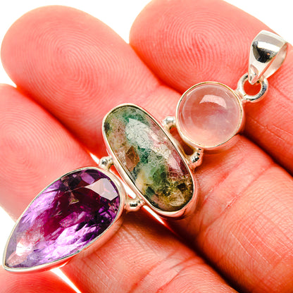 Silver pendant close-up with faceted amethyst, multicolor tourmaline, rose quartz cabochon