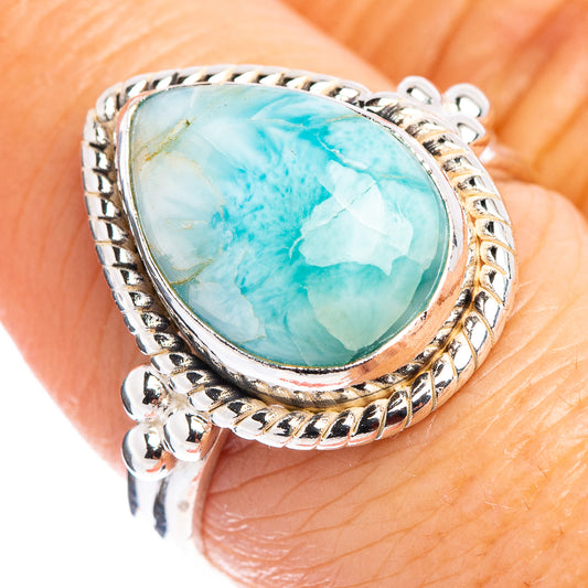 Sterling silver ring with oval Larimar turquoise stone, rope bezel and prong setting