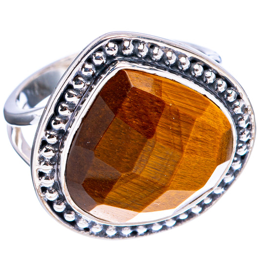 Sterling silver tiger's eye ring with oval brown stone and raised beaded edge