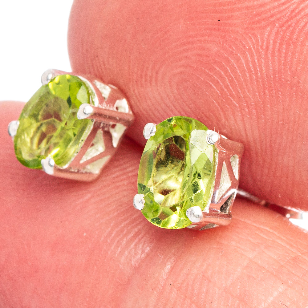 Peridot dainty earrings with oval green gemstone in 925 silver prong setting