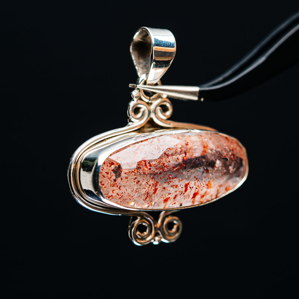 Oval lepidocrocite pendant in .925 sterling silver, ornate loops and open swirl setting