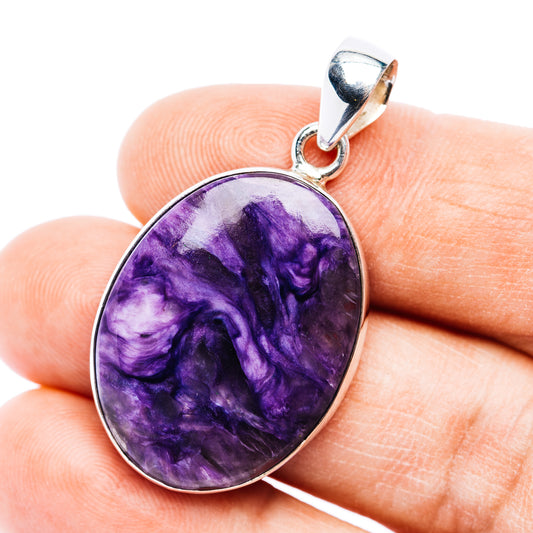 Charoite pendant in oval purple stone with .925 sterling silver bezel and bail